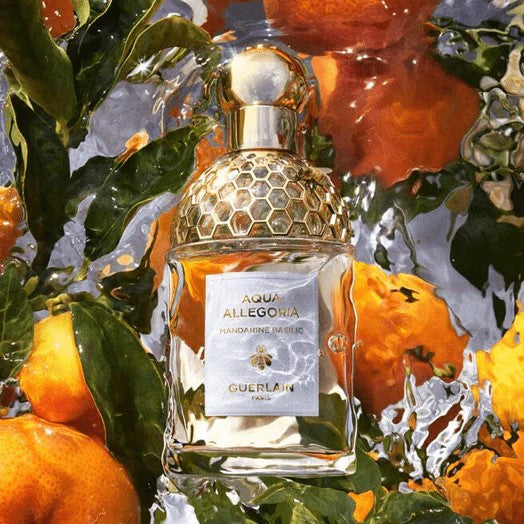 Aqua Allegoria Mandarine Basilic perfume surrounded by basil and mandarin – fresh citrus scent